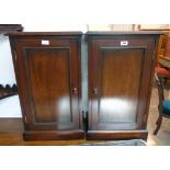 A pair of 17" reproduction mahogany Victorian style bedside pot cupboards, each enclosed by a