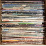A large mixture of assorted vinyl LPs including Bob Dylan, David Bowie, The Pogues, Van Morrison,