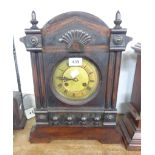 A 19th Century American stained wood cased shelf clock with spring driven gong striking movement -