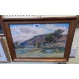 Albert Stevens: a gilt framed watercolour, depicting a country landscape with hill in background -