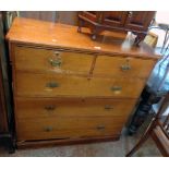 A 3' 6" Victorian stained pine chest of two short and three long graduated drawers with canted