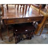 A 34 1/2" reproduction mahogany and cross banded sofa table with two frieze drawers, set on