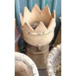An old stoneware chimney pot of square form