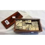 A boxed set of Victorian bone nine spot dominoes