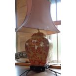An Oriental temple jar pattern lamp with shade