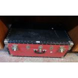 A 30" vintage black and red and metal bound travelling trunk