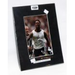 Patrick Kluivert: an unframed mounted photograph signed by the player with Icons certificate verso -