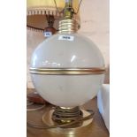 A vintage globular table lamp with frosted and spangled finish