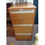 A 19" Caplan teak effect three drawer filing cabinet