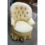 A 19th Century boudoir tub chair with remains of later button back upholstery, set on mahogany