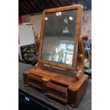 A Victorian mahogany platform dressing table mirror with oblong plate and two drawers to base, set