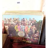 Ten Beatles vinyl LPs including Sgt Pepper, Magical Mystery Tour, White Album, etc. - various