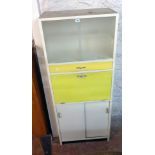 A 28 1/2" 1950`s painted mixed wood kitchen unit with glass sliding doors to top, long drawer,