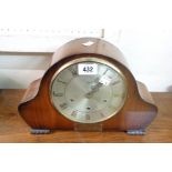 A mid 20th Century Smiths polished walnut cased mantel clock with eight day dual chiming