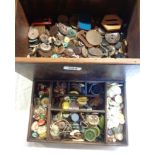 A wooden sewing box containing assorted vintage and other buttons