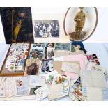 A box containing a collection of ephemera including letters, postcards, other trade cards, receipts,