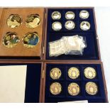 A Windsor Mint Winston Churchill coin set - sold with a Heroes of WW2 set, and Defining Moments of