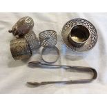A small quantity of silver plated items including a thimble, pepperette, napkin rings, etc.