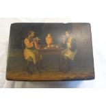 An Imperial Russian lacquer box depicting two men drinking tea - signed to inside of lid with gilt