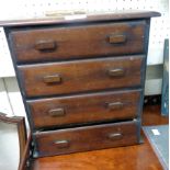 A 12 1/4" vintage stained pine chest with flight of four long graduated drawers, the top one with