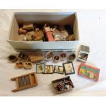 A good collection of vintage dolls house furnishings including baskets, crockery, longcase clock,
