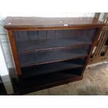 A 4' late Victorian mahogany four shelf open bookcase, three being adjustable, set on plinth base