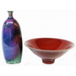 Two pieces of David White studio pottery comprising red glaze footed bowl and purple souffle glaze
