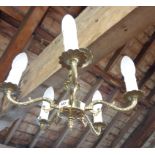 A brass five branch chandelier