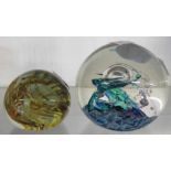 A small Isle of Wight glass paperweight with internal swirls - sold with a Selkirk glass '