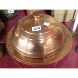 A hammered and coppered copper lidded dish - sold with a similar hanging pot
