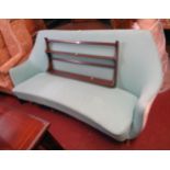 A 5' 6" retro style Scandinavian egg shaped settee upholstered in duck egg blue and white material