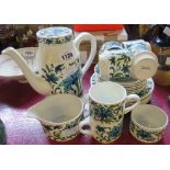 A Midwinter Spanish Garden coffee set comprising six trios, cream jug and sugar bowl