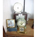 Six small vintage timepieces including Smiths Alarm, Europa, etc. - various condition