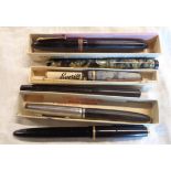 Five vintage fountain pens including Parker Duofold, Swan, etc.