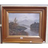 G. Dawson: a gilt framed oil on canvas, depicting a mountain lake landscape - signed