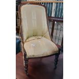 A Victorian mahogany part show frame swept back boudoir chair with remains of upholstery, set on