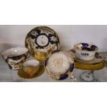 A Coalport demitasse cup with saucer with jewelled decoration, similar jug and saucer, two
