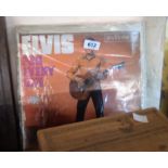 A small collection of Elvis Presley and other mainly male solo artist vintage vinyl LPs