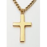 A hallmarked solid 9ct. gold cross, on plated chain