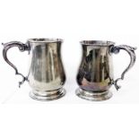A Georgian silver baluster tankard with acanthus scroll handle - base marks for London 1766, maker's