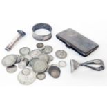 A silver cigarette case, buttonhole bud vase, napkin ring and pusher - sold with a small quantity of
