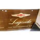 A vintage polished Italian walnut dealership sign for Lagonda The Thoroughbred Car, with transfer