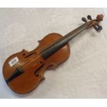 A small old violin used as an advertising model - approximately 1/4 size