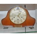 A mid 20th Century Smiths polished walnut cased mantel clock with eight day dual chiming