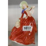 A Royal Doulton figure Autumn Breezes HN 1934