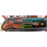 A vintage violin and in wooden case (a/f) - sold with the remains of another violin with