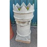 A vintage stoneware chimney pot of crenelated form