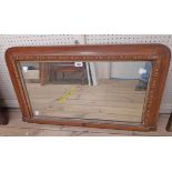 A 34" Victorian walnut framed overmantel mirror with oblong plate and Tunbridge ware style