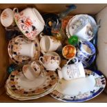 A box of assorted china and glass including part tea sets, commemorative items, etc.