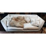 A 7' 10" modern box framed settee with beige shot velour upholstery and a selection of scatter